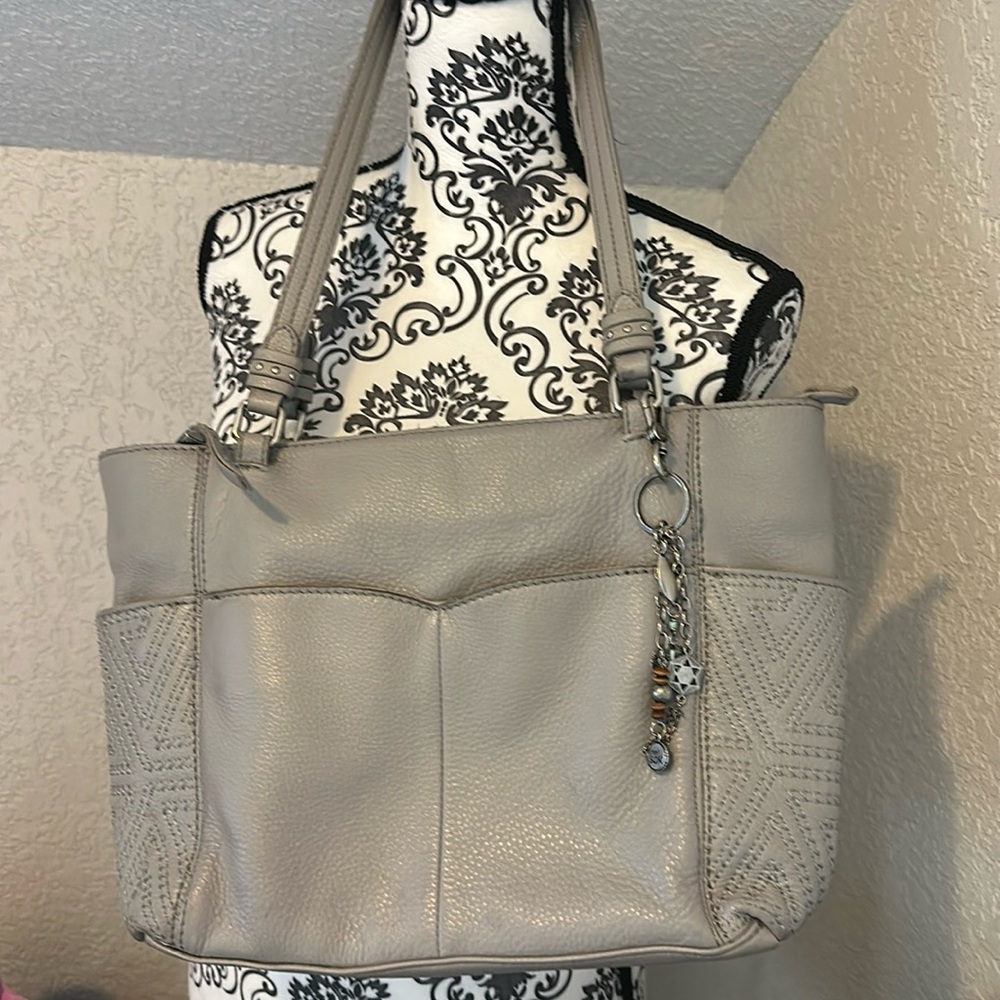 The Sak Hand bag. 15”x9” Grey Leather